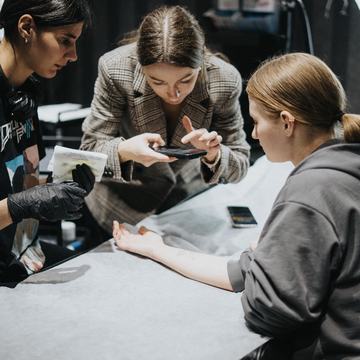 Student practicing laser lightening