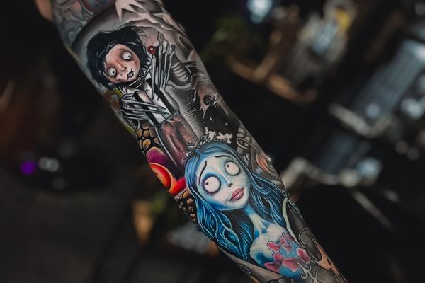 Colourful full-sleeve tattoo