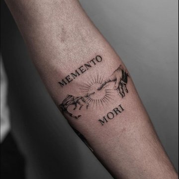 Memento Mori tattoo with reaching hands and sun