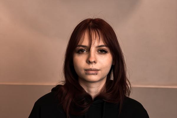 Lower lip piercing with minimalist jewellery